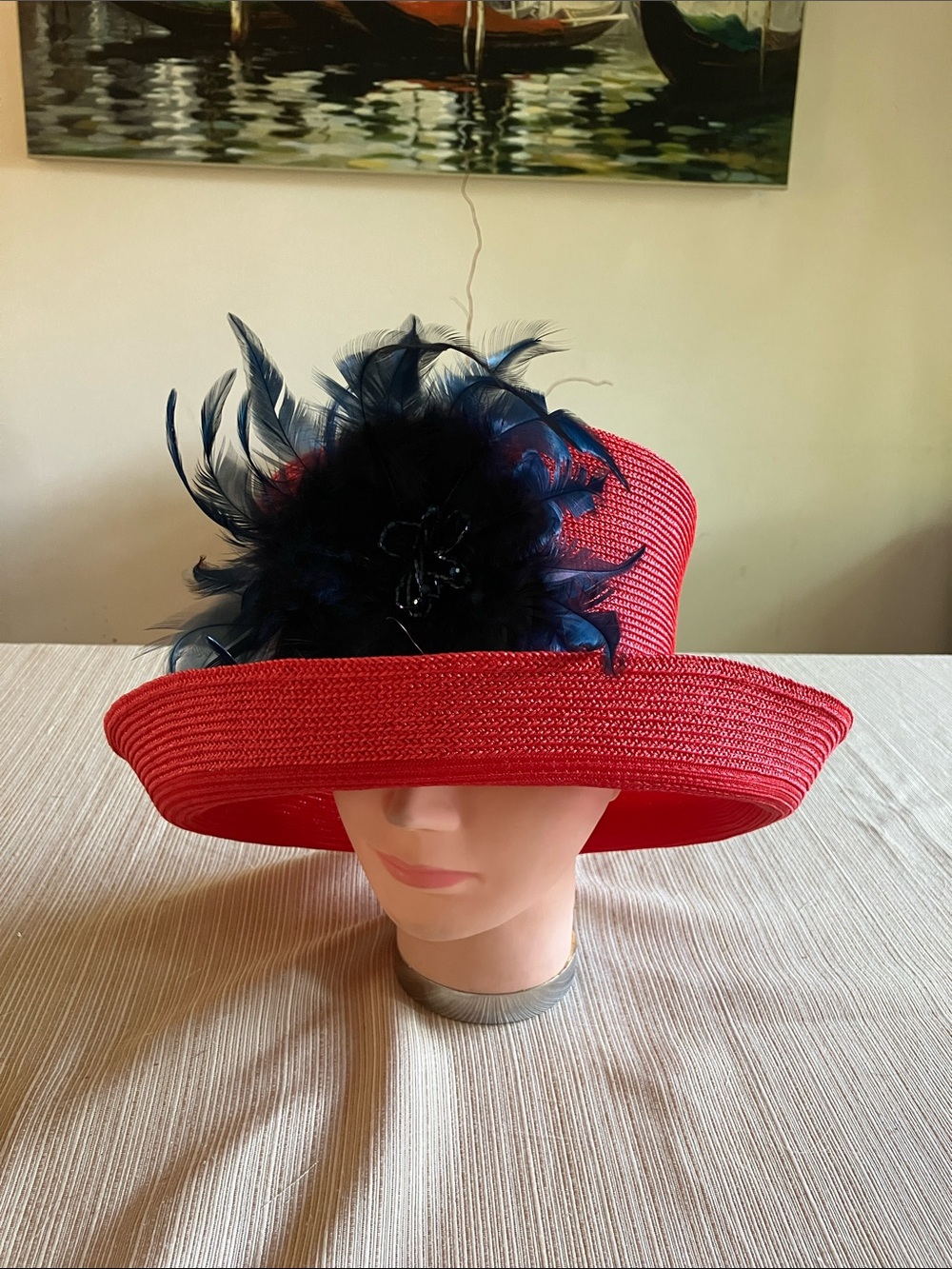 Elegant Red Straw Hat with Navy Blue  Feather Accent
